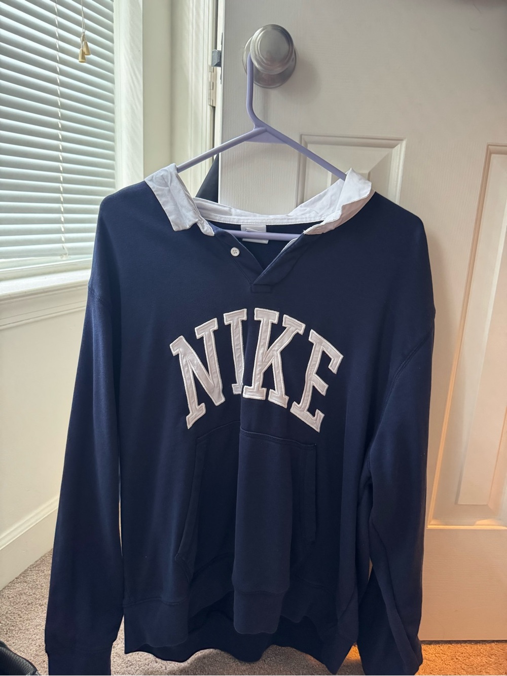 Nike Navy Pullover Hoodie with White Lettering and Contrast Collar
